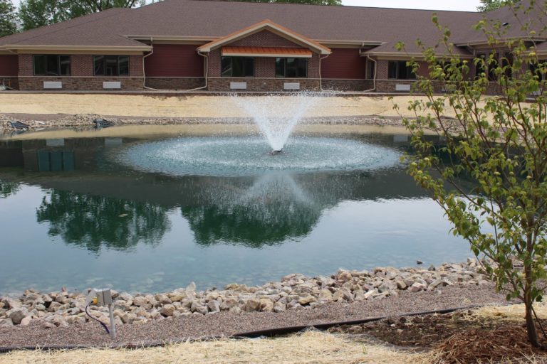 water body in front of the senior assisted living facility