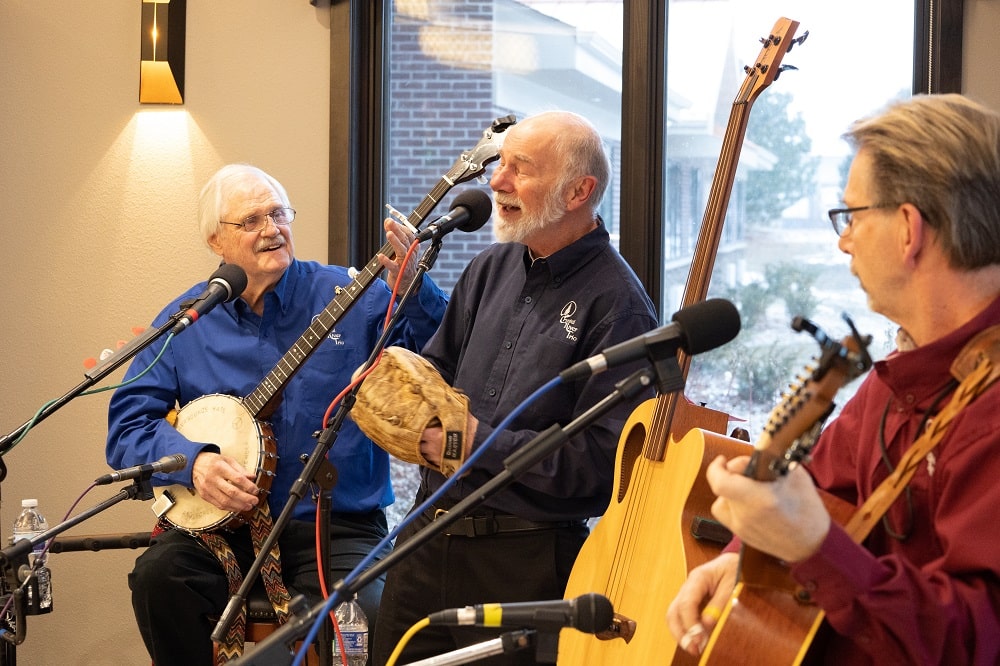 Seniors at the CopperStone Assisted Facility playing music at the Club house